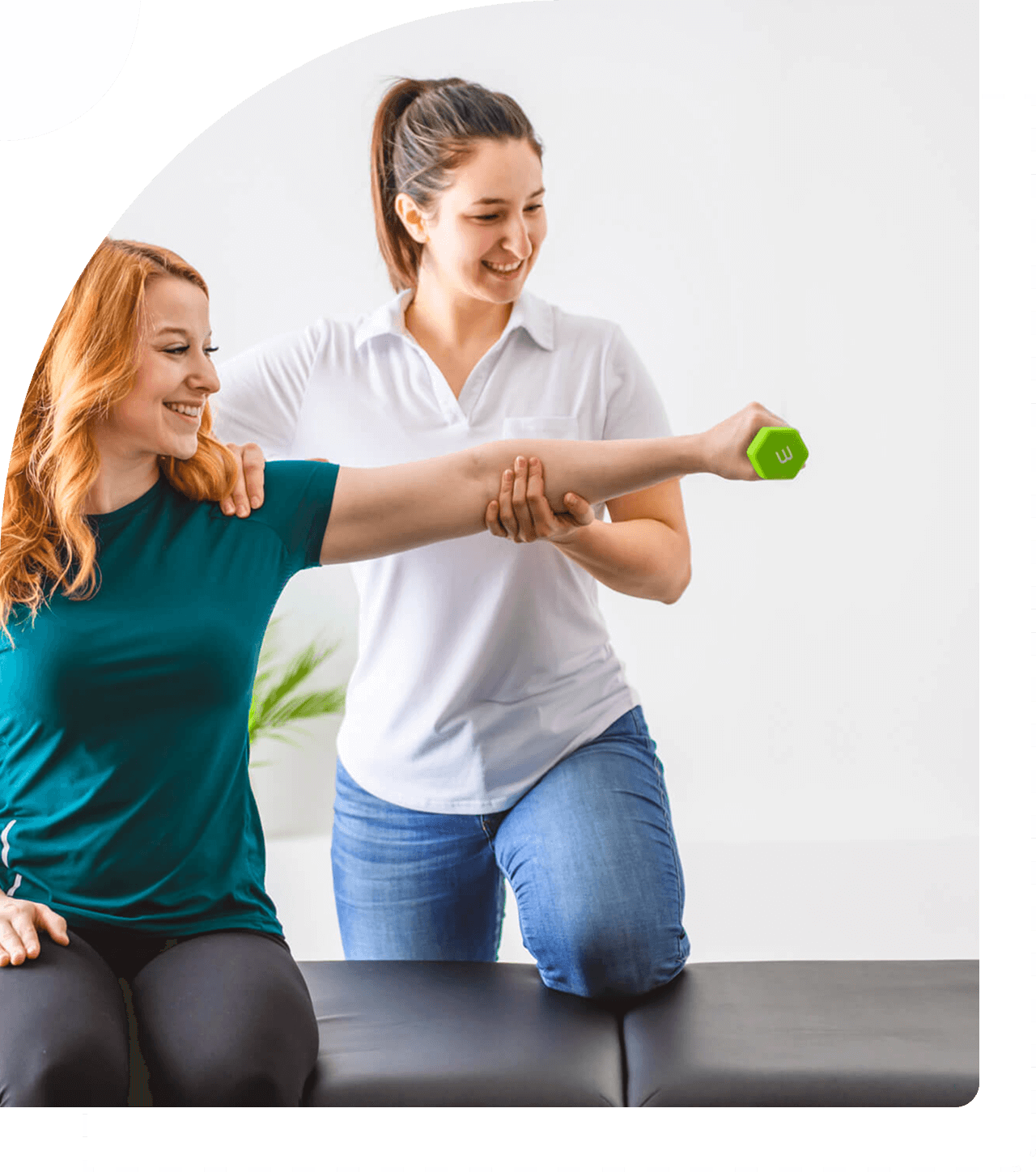 Woman exercising with physical therapist's assistance.