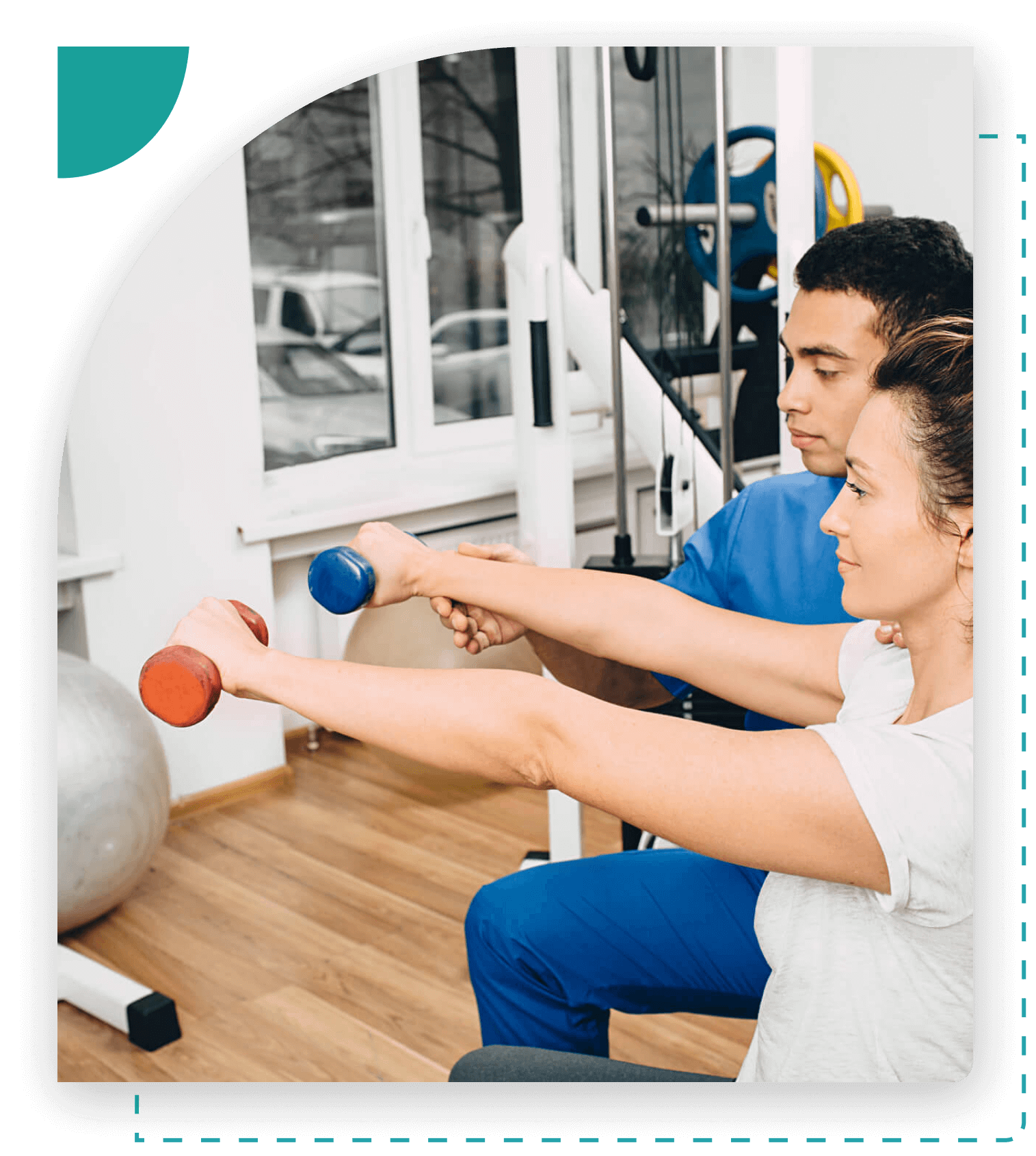 Therapist assisting woman with arm exercises.