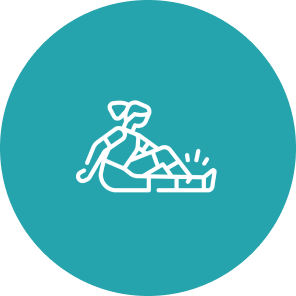 Person sitting with injured leg icon.